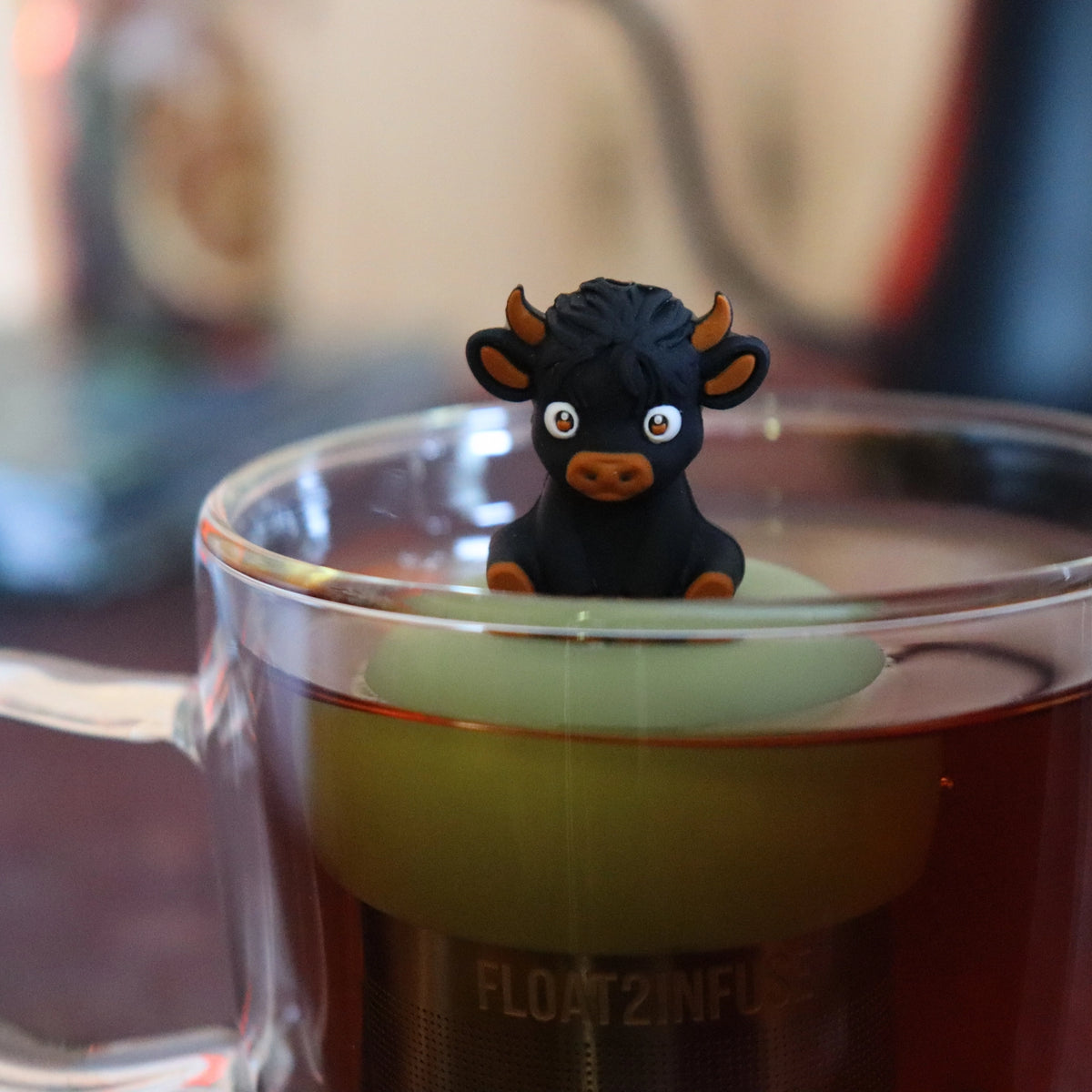 Black Baby Highland Cow | Floating Tea Infuser | Green Base